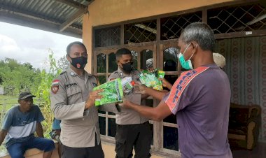 Babinkamtibmas-Desa-Kuanek-mendukung-pemulihan-Ekonomi-Rakyat-dengan-membagikan-Bibit-Sayur