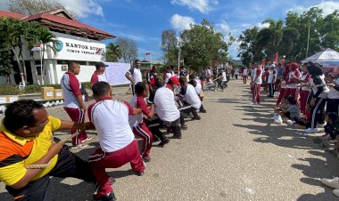 Sinergi-dan-Keakraban-Diuji-dalam-Lomba-Tarik-Tambang-Yang-di-Gelar-Polres-TTU